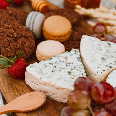assortment of cheese and cookies
