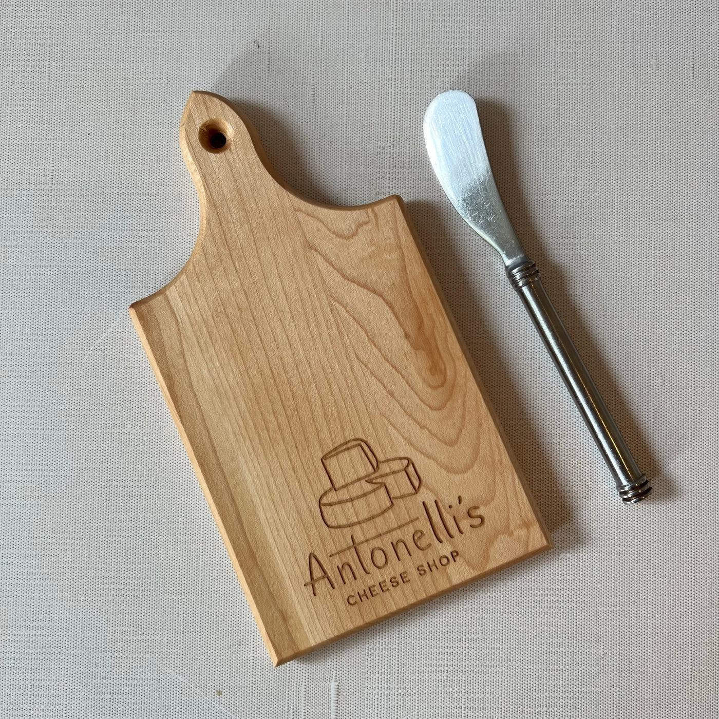 Small cutting board with stainless steal spreader