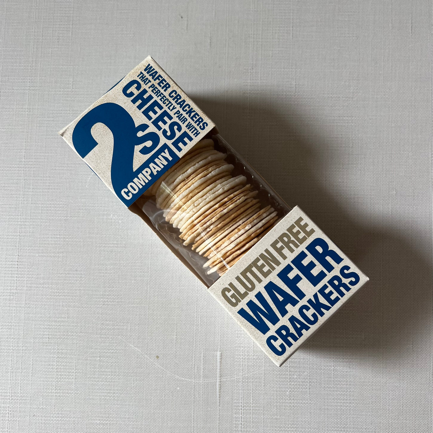 Sleeve of gluten free wafer crackers in cardboard