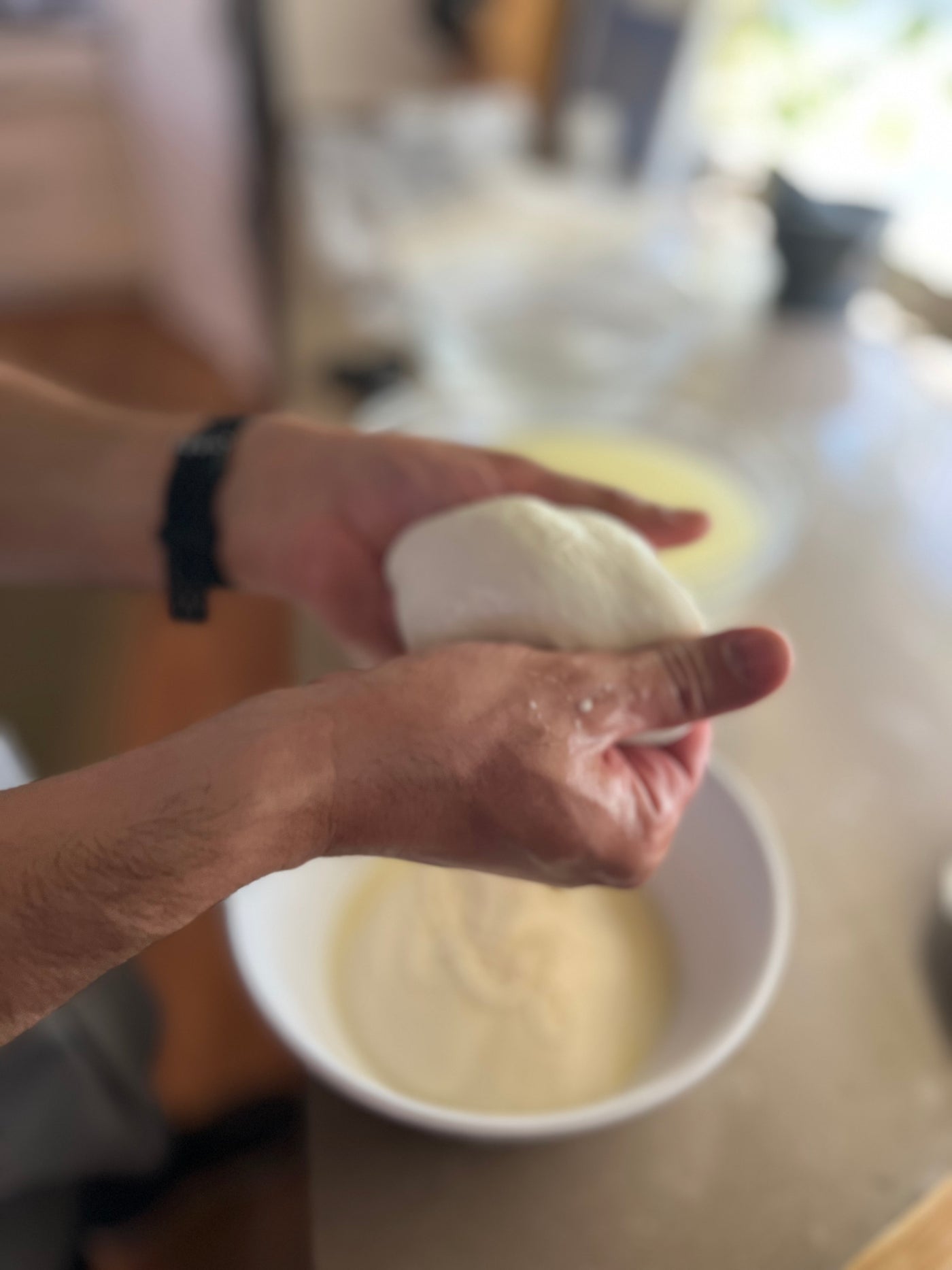 John Antonelli making fresh mozzarella