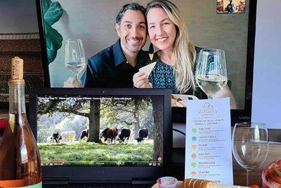 Image of John and Kendall on a computer screen showcasing our virtual cheese events.