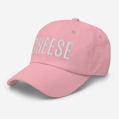Pink "CHEESE" hat with curved visor and adjustable strap.
