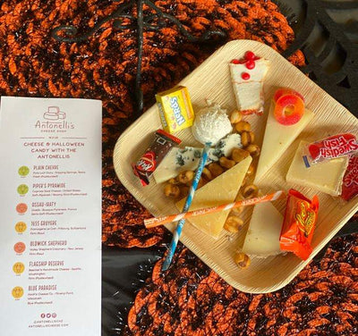 image of past halloween candy and cheese pairing plate with multiple cheeses and multiple pairings