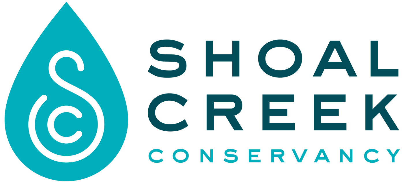 Shoal Creek Conservancy logo with a stylized water droplet design.