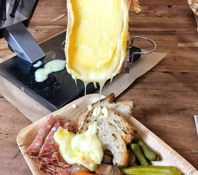 image of cheese having been scraped atop of bread