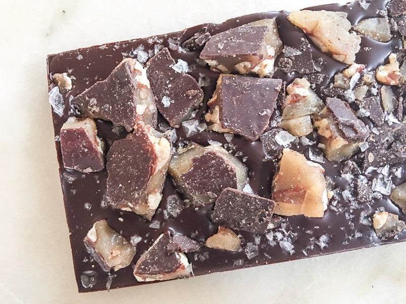 Texas Pecan Brittle Bar with dark chocolate and pecan brittle chunks.
