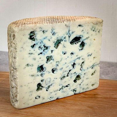 Image of a half wheel of fourme d'ambert