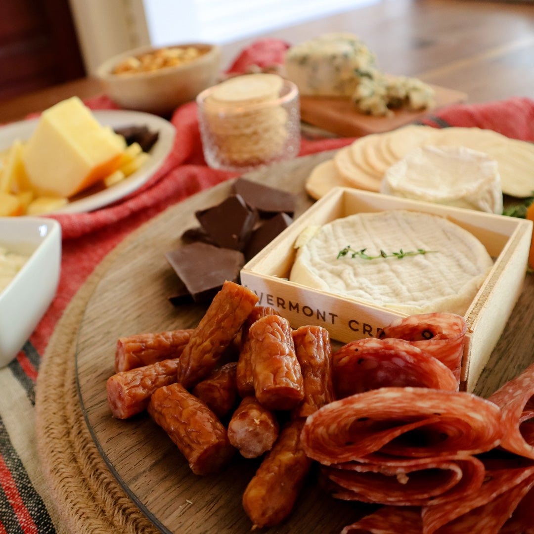 plate of multiple cheeses and pairings