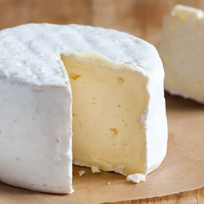 Soft-ripened Cowgirl Creamery cheese with creamy interior and white rind.